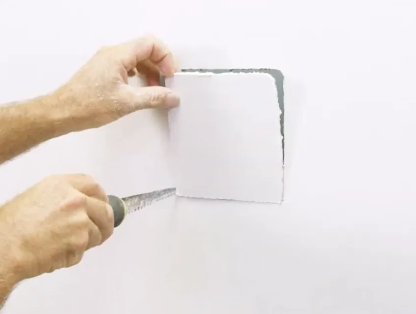 Cut the rectangular opening in the plasterboard wall using a utility knife or jab saw